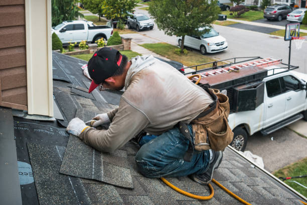 Professional Flat Roof Repair technician working in Piney Fork, OH